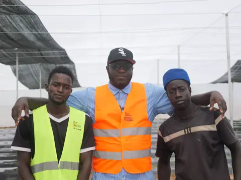 L’équipe du chantier sous la serre